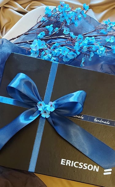 Beautifully packed black and blue box for Ericsson Pakistan. Hand-painted pen holders corporate gifts