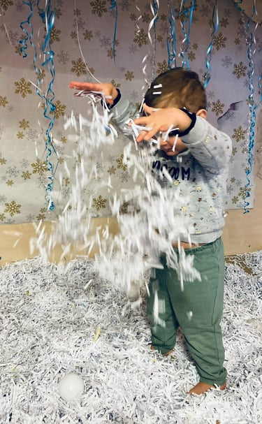 enfant et fausse neige