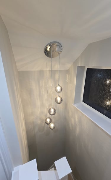 Hanging light in the stair well installed by Easy Spark Ltd in Bromley Kent