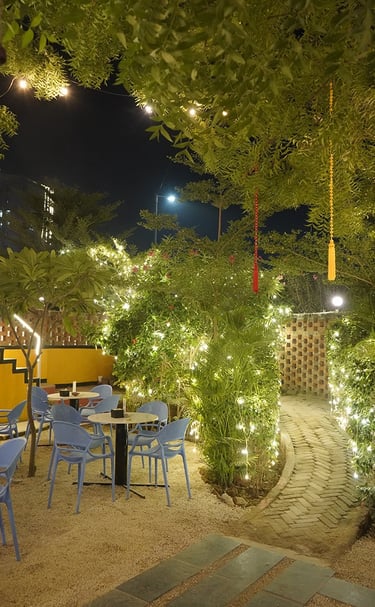 basil entry with a table and chairs and lights