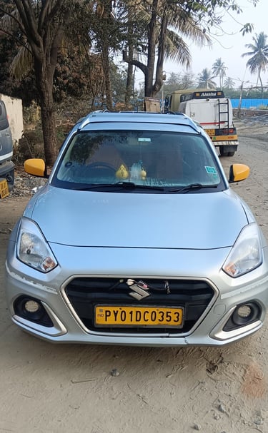 ​Clean and well-maintained Swift Dzire petrol car ready for South India Drop Taxi ride