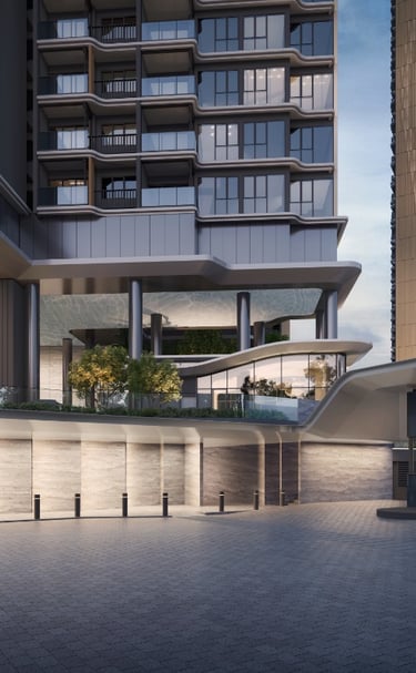 Modern luxury condominium entrance at Vela Bay with sleek architecture and landscaped driveway.