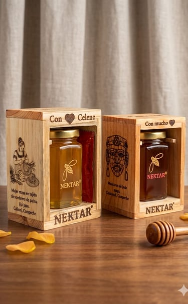 Two jars of Nektar natural honey in decorative wooden gift boxes with a honey dipper on a table.