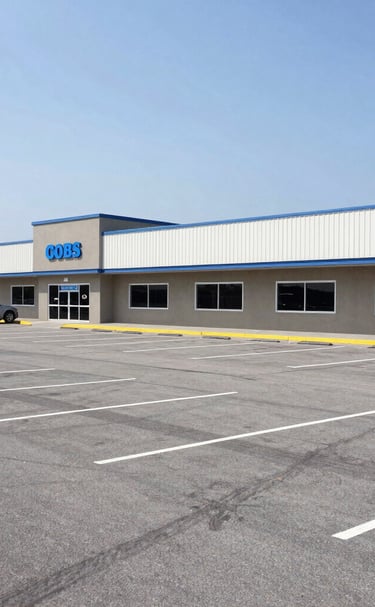 Wide shot of a clean apartment complex exterior after pressure washing