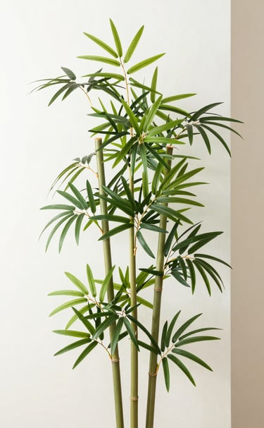 A modern living room featuring a tall, lush artificial ficus tree in a minimalist white pot.