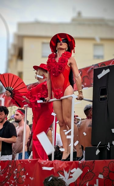 a woman in a red dress and a man in a red dress