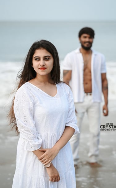 White dress save the date shoot at snehatheeram beach