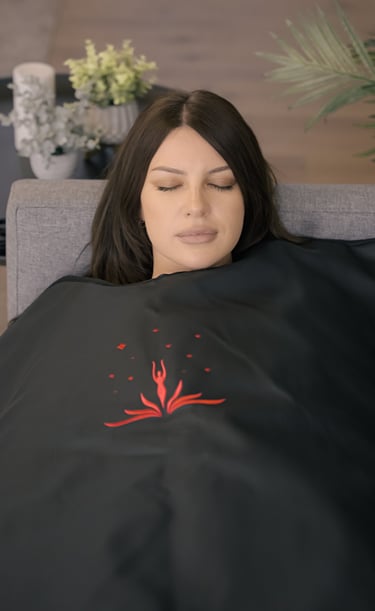 Lifestyle photo of woman using Healing Temp sauna blanket by BrandNests creative agency.