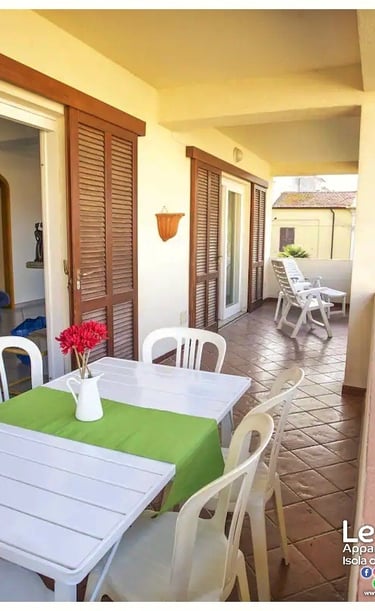 table on a balcony overlooking the sea