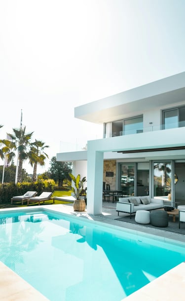 a large pool with a couch and a couch