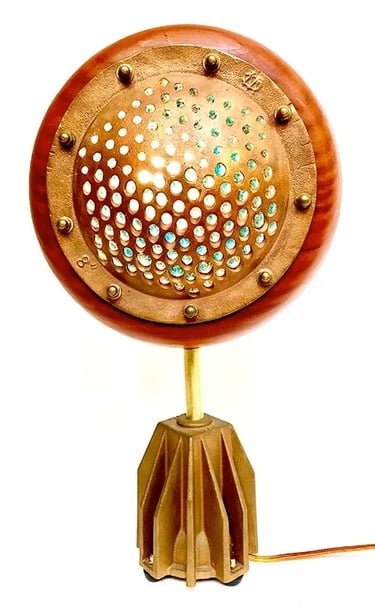 Custom light made from brass boat drain and redwood.