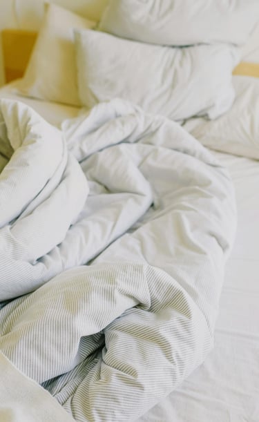 a messy unmade bed