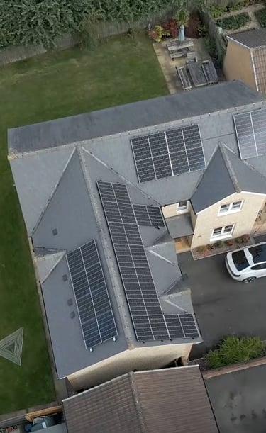 a house with solar panels installed on a roof