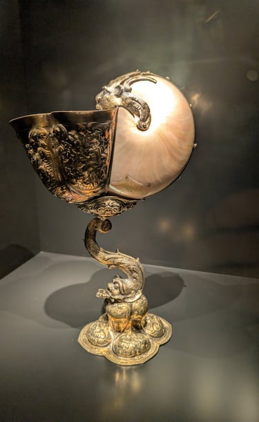 a nautilus shell chalice in with intricate gold work housed in the Hungarian National Museum