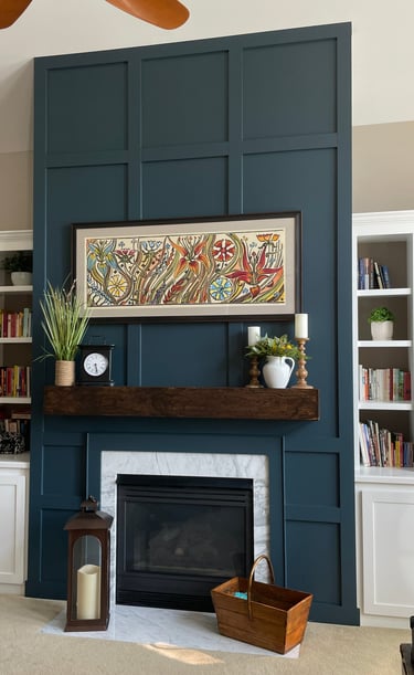 Board and Batten fireplace face with custom, faux distressed mantel.