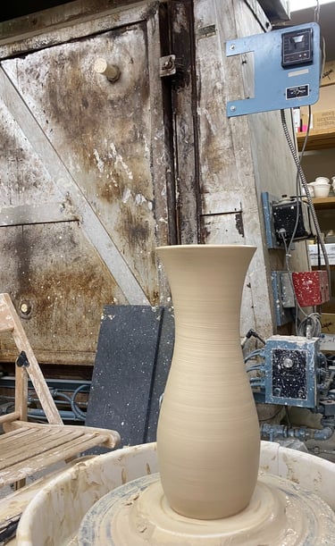 A large clay vase thrown on the wheel by Ben Trammell at AV Clay Creations