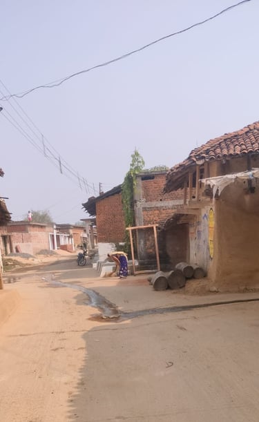 woman is brooming on the street