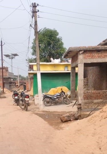 three bike under electric pole 