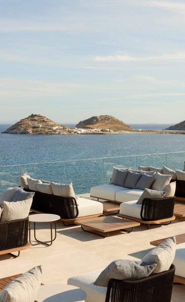 a lounge area with couches and chairs