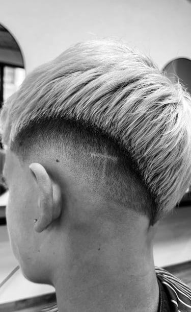 a man with a shaved undercut and a shaved undercut