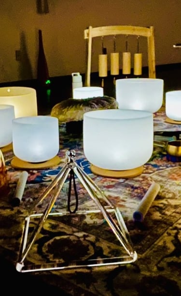 glowing sound bath setup with instruments