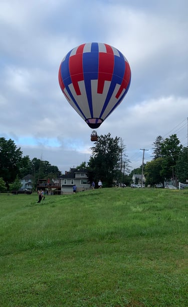 a hot air balloon in a field in Binghamton New York