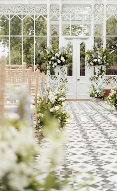 Wedding venue with white and blue flowers