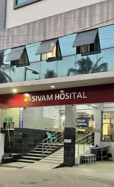 a hospital entrance with stairs and stairs leading to a hospital