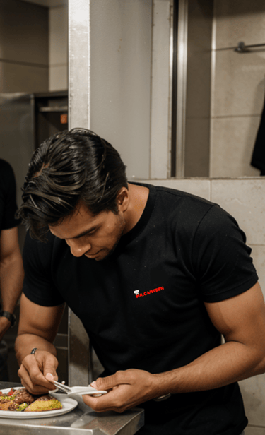 a man in a black shirt is eating food
