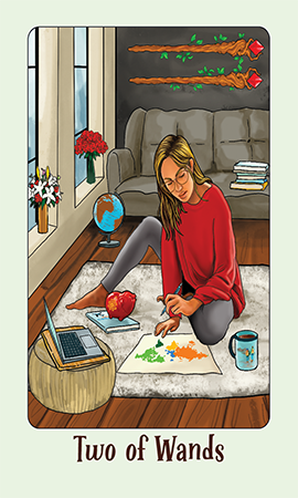 Jasper tarot two of wand a woman sitting on a rug with a laptop and a laptop