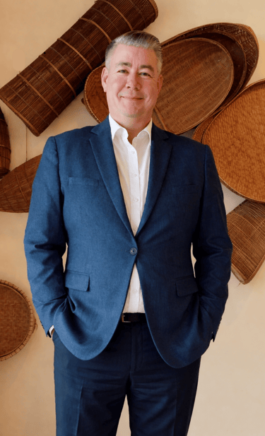 Portrait of Lance, founder of MagVin Labs, standing confidently in a professional setting