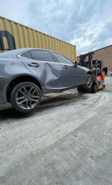 Custom steel fabricated fork lift fork extensions in use