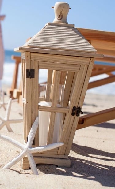 tall wood lantern with white starfish included in package