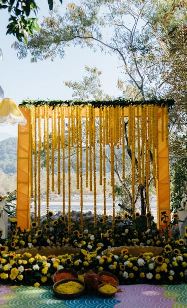 "Ring ceremony decoration with elegant backdrop and flowers"