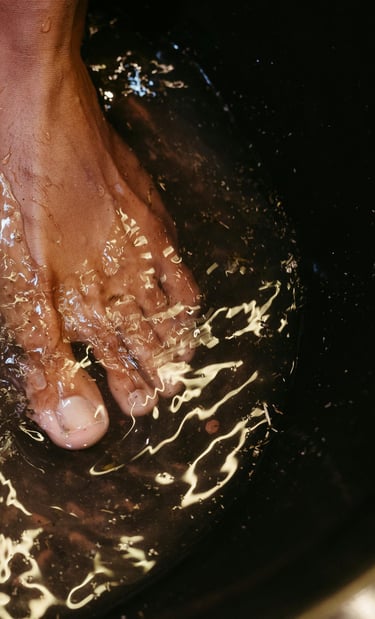 feet soaking in the water