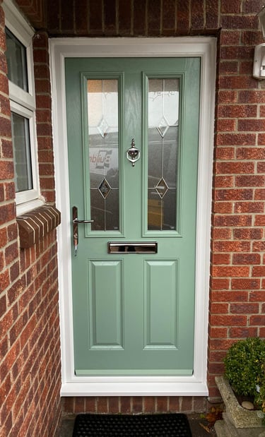 a new chartwell green l front door on red brick house installed by buildmydoor 