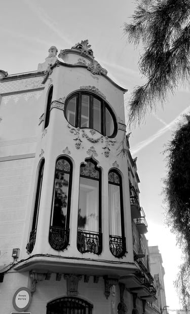 a building with a balcony in Sitges