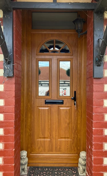 wood coloured new composite front door fitted in Hampshire