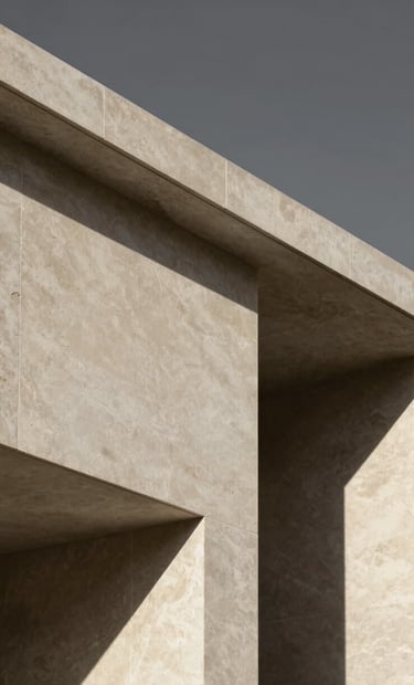 Architectural detail shot with very hard light, creating sharp lines and deep shadows. Minimalist and artistic. The stone texture is in #D5BFB3 sand tones, with the sky or shadow area in charcoal #363131. Elegant and sophisticated.