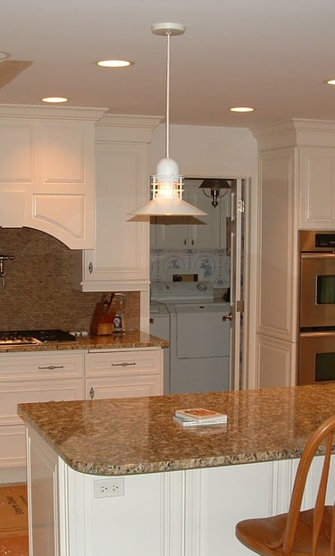 Open kitchen remodel with island and updated cabinets