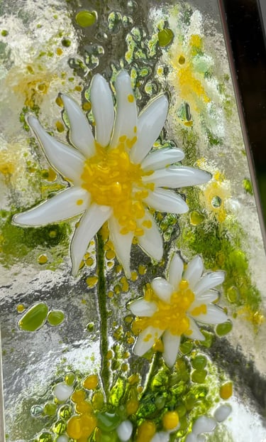a picture made from fuse glass with flowers