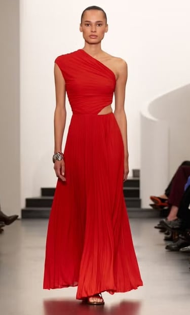Ralph Lauren Spring/Summer 2026 red one-shoulder pleated gown on the runway.