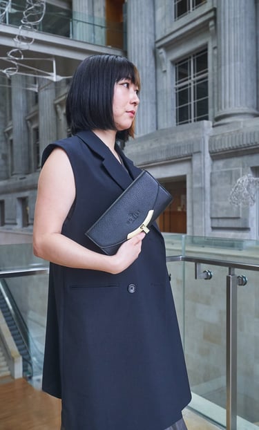 lady holding black clutch | olio my shop