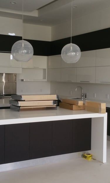 Modern luxury kitchen renovation in Weston featuring custom handle les cabinetry 