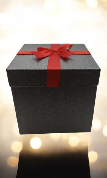 Caja rigida para regalo color plomo con moño rojo.