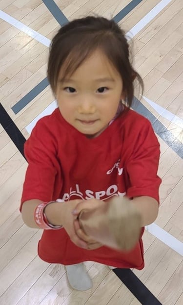 child with tanto in calgary aikido class