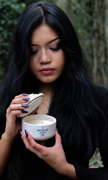 rangliciene showcasing her handmade scented soy candle
