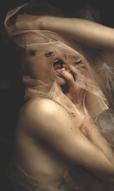 a woman with a veil on her head and a veil on her head