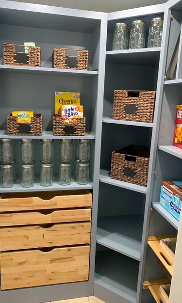 Pantry with roll out trays and mason jars 