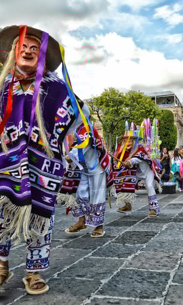 a group of people in colorful costumes and costumes